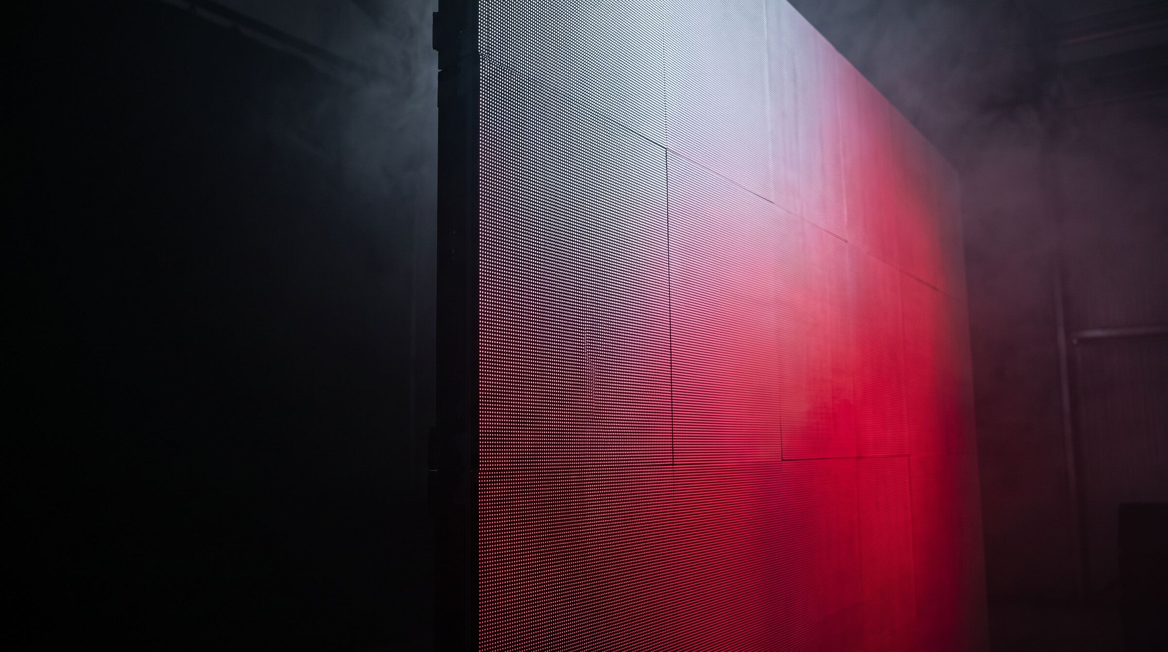 Fine-pitch LED video wall installation illuminated in a darkened venue